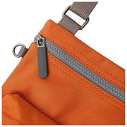 roka-orange-chelsea-b-medium-recycled-nylon-sling-bag-35906631