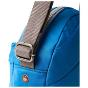 roka-blue-paddington-b-small-recycled-nylon-crossbody-bag-35906674
