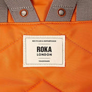 roka-orange-canfield-b-medium-recycled-nylon-backpack-35906541