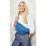 elie-beaumont-blue-arc-sling-bag-34382148