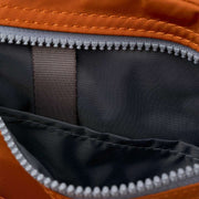 roka-brown-chelsea-b-medium-recycled-nylon-sling-bag-34458619