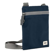 Roka Navy Chelsea Sustainable Nylon Pocket Sling Bag